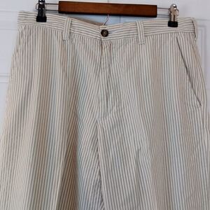 IZOD tan and white pinstripe seersucker pants